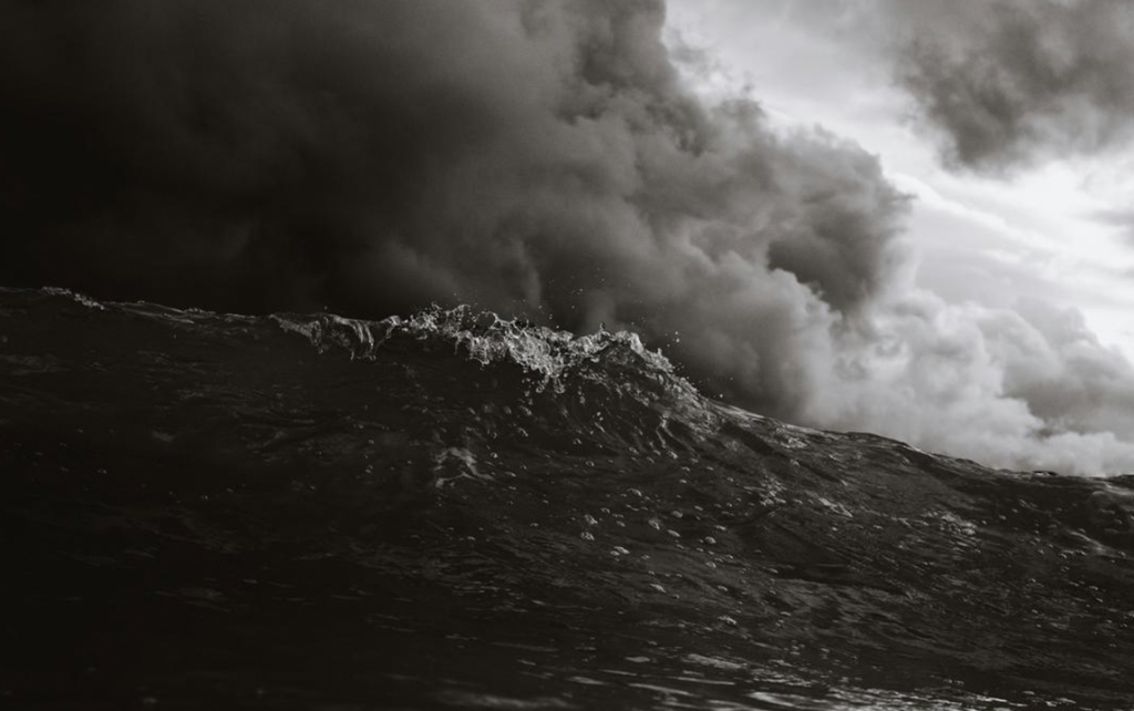 Dark storm clouds over rough sea during severe weather conditions